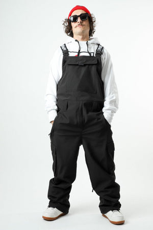 
                  
                    Load image into Gallery viewer, Black snowboard bib pants
                  
                